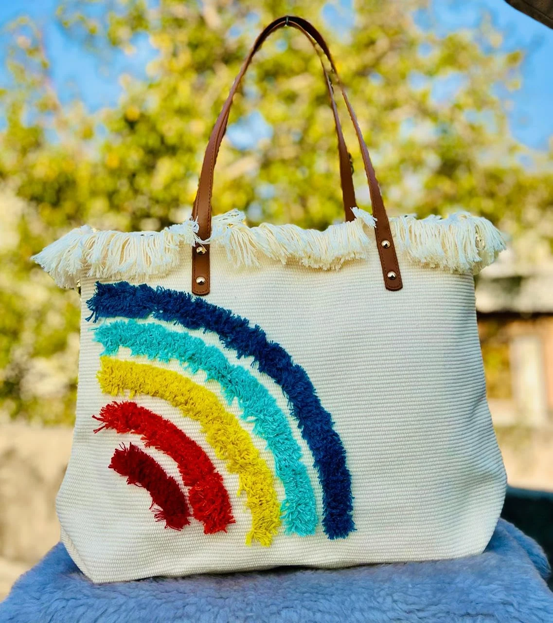 Aditya Creations Woven Tote Bag with Colorful Fringe Stripes, Brown Leather Handles, White Beach Bag